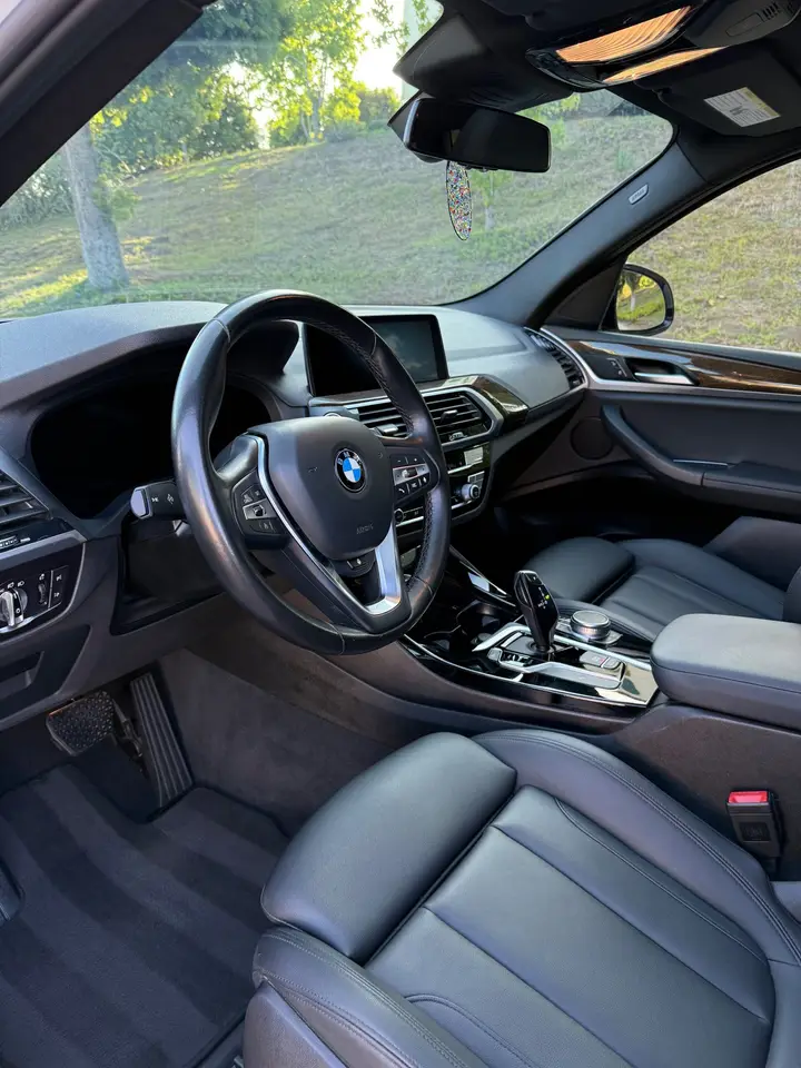 BMW front interior after a monthly maintenance detail